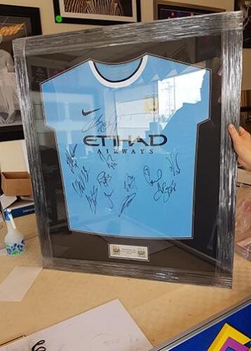 Manchester City signed and framed football shirt